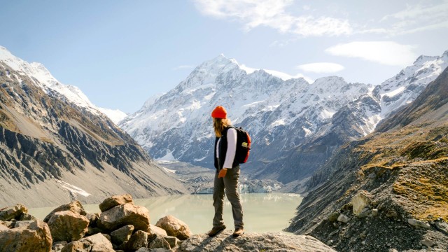 Space Traveller hiking top of the world