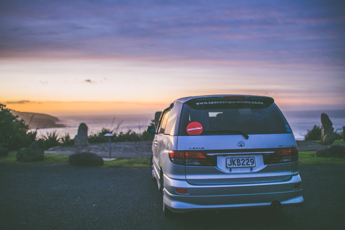 Campervan parked close to beach to enjoy the sunset