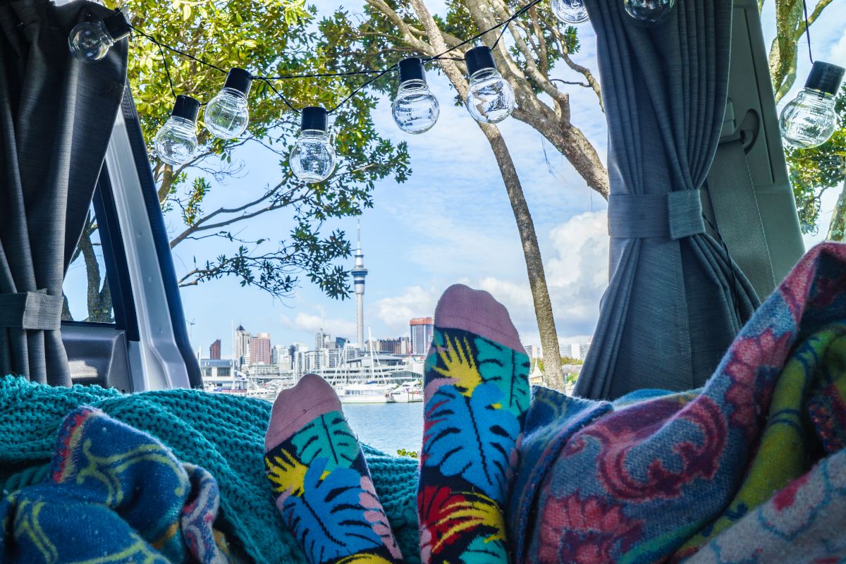 Space Traveller lying in bed of the Dream Sleeper Mini and enjoying the view