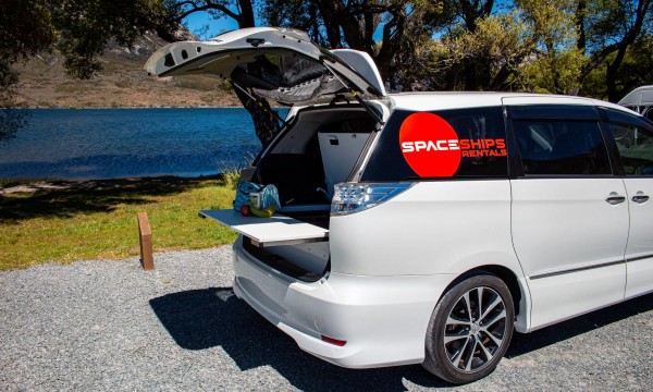 Sigma   parked near lake back open ready to set up